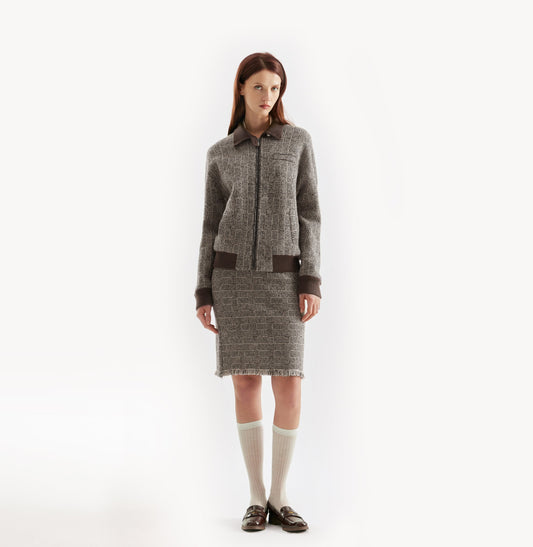 Dark grey wool bouclé plaid jacket with metallic yarn and contrast trims. front-view