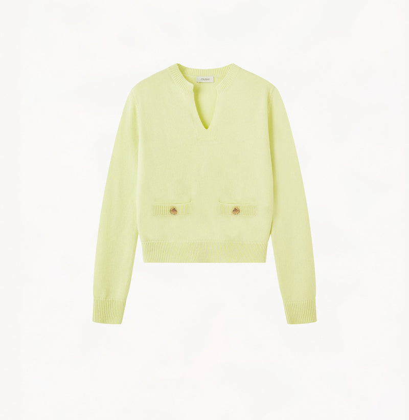 Cashmere sweater with placket in yellow.