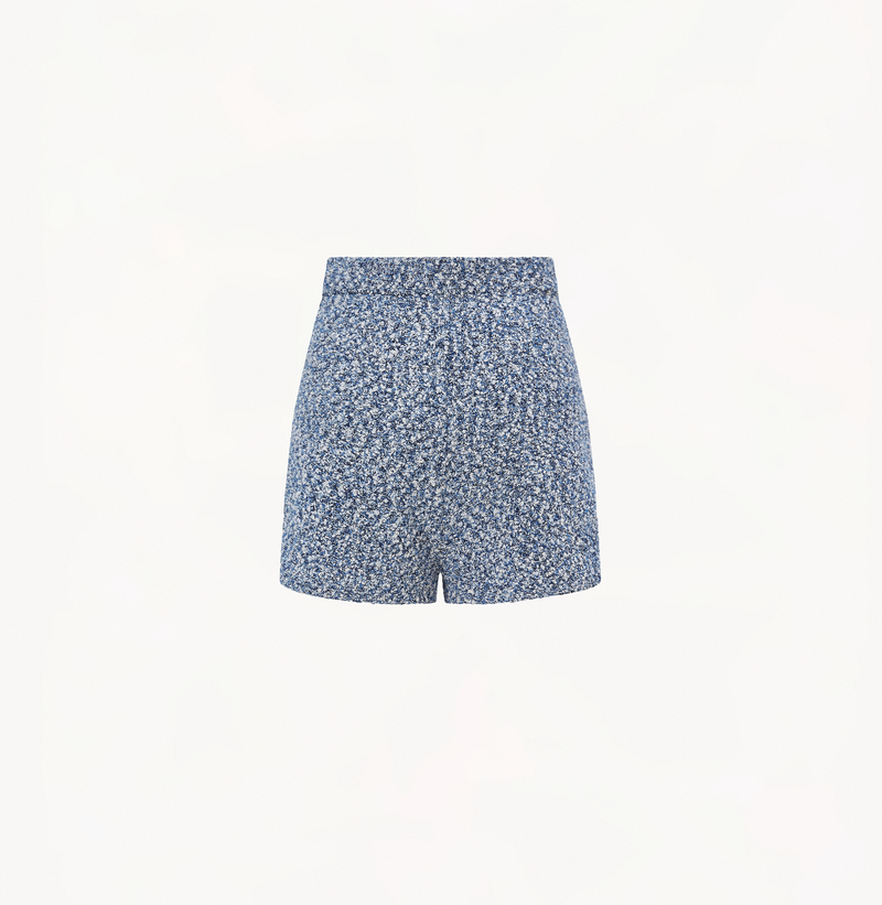 Boucle knitted shorts in blue with pockets.