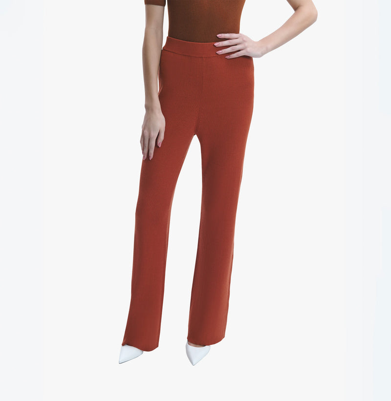 Silk cashmere blend ribbed flare pants in brown red.