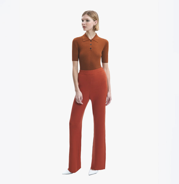 Silk cashmere blend ribbed flare pants in brown red.