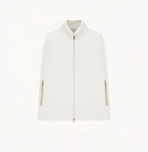 Quilted-knit cape in white. 