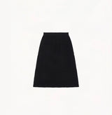Black A line midi skirt with embossed jacquard texture built in side pockets and structured waist hem details.