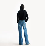 Black jacquard-textured sweater jacket in wool blend with boxy silhouette and long sleeves. rear-view.
