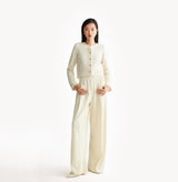 White jacquard-textured sweater jacket in wool blend with boxy silhouette and long sleeves.