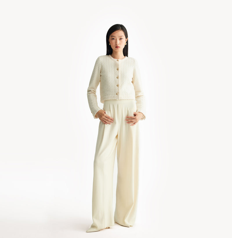 White jacquard-textured sweater jacket in wool blend with boxy silhouette and long sleeves.