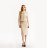 Cashmere bouclé jacket in beige.