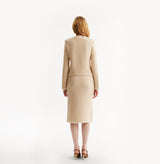 Cashmere bouclé jacket in beige.