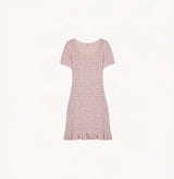 Textured linen blend. Waist-shaped puff-sleeve dress with flared hem and contrast trims.