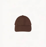 Brown baseball cap in cotton twill with embroidered monogram logo and classic coffee tones. 