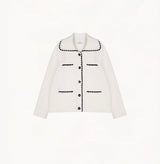 White wool-cashmere jacket for ladies with a wide lapel and hand-crocheted trim detailing.