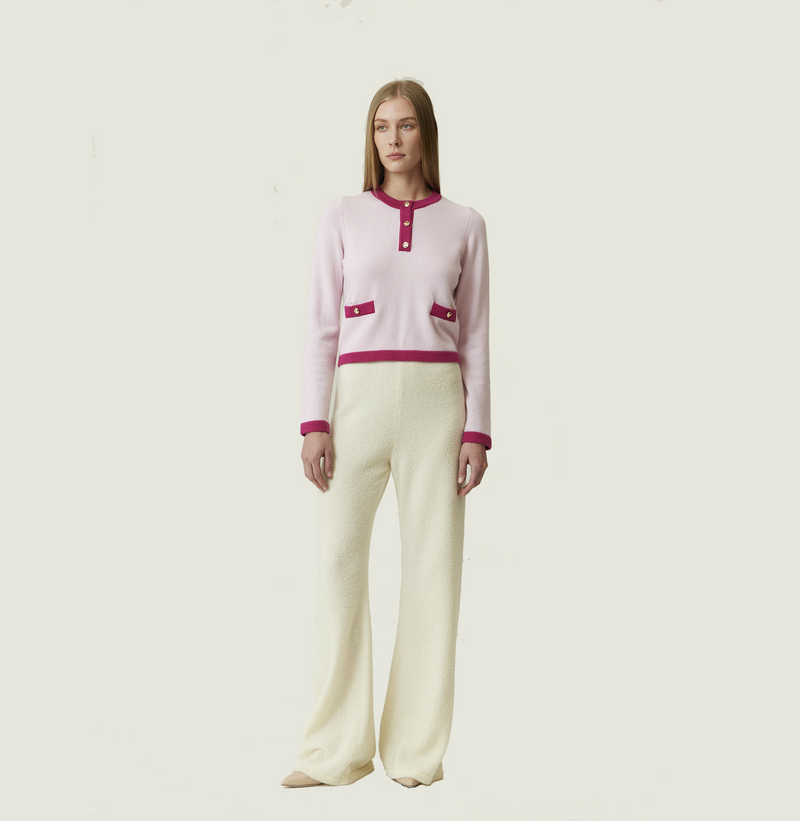 Cashmere colorblock sweater in pink and fushia with buttons in the front. left-view