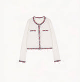 White wool-cashmere cardigan with contrast tweed trims at placket, hem, cuffs and pockets.