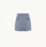 Boucle knitted shorts in blue with pockets.