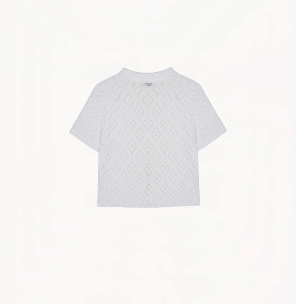 White cotton-linen diamond pointelle shirt with metallic trim and Polo collar.