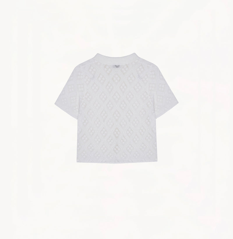 White cotton-linen diamond pointelle shirt with metallic trim and Polo collar.