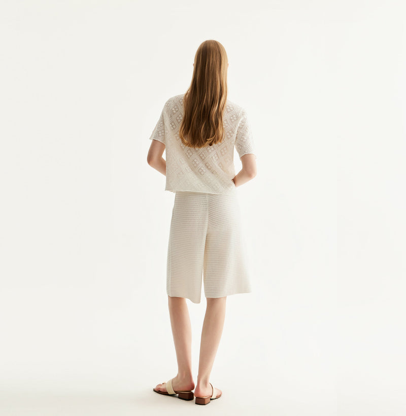 White cotton-linen diamond pointelle shirt with metallic trim and Polo collar. rear-view
