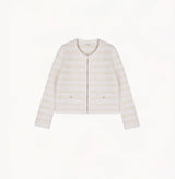 White female bouclé wool jacket with metallic threads, striped jacquard and shoulder pads.