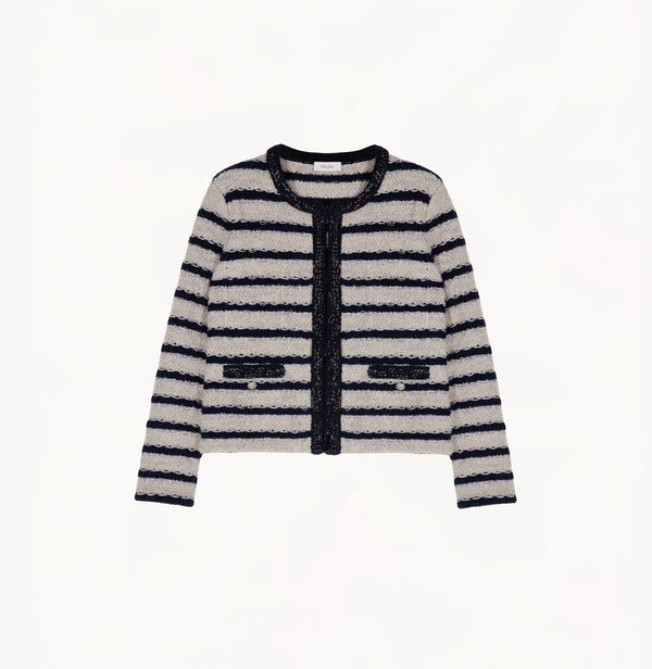 Blue female bouclé wool jacket with metallic threads, striped jacquard and shoulder pads.