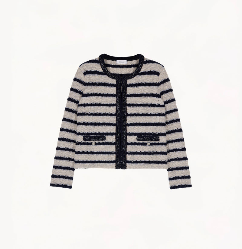 Blue female bouclé wool jacket with metallic threads, striped jacquard and shoulder pads.
