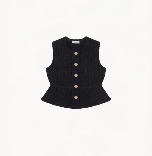 Flared hem vest in black.