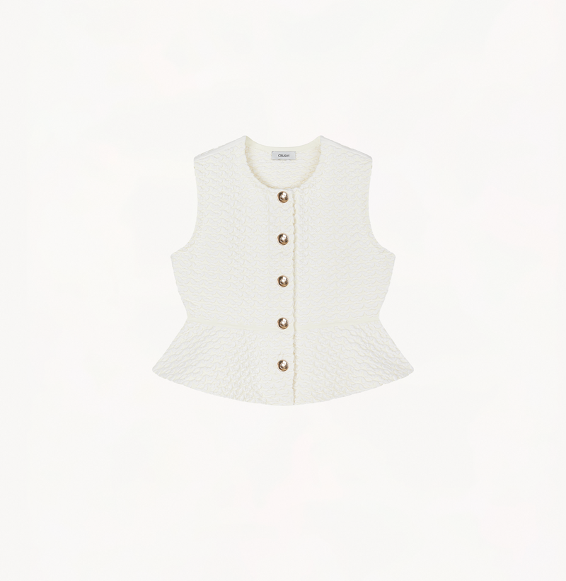 Flared hem vest in white.