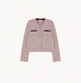 Burgundy ladies cropped boucle jacket in cashmere blend with shoulder padding, folded edges, and double-layered pocket flaps.