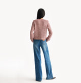 Burgundy ladies cropped boucle jacket in cashmere blend with shoulder padding, folded edges, and double-layered pocket flaps. rear-view.

