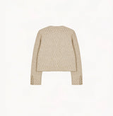 Beige ladies cropped boucle jacket in cashmere blend with shoulder padding, folded edges, and double-layered pocket flaps. 