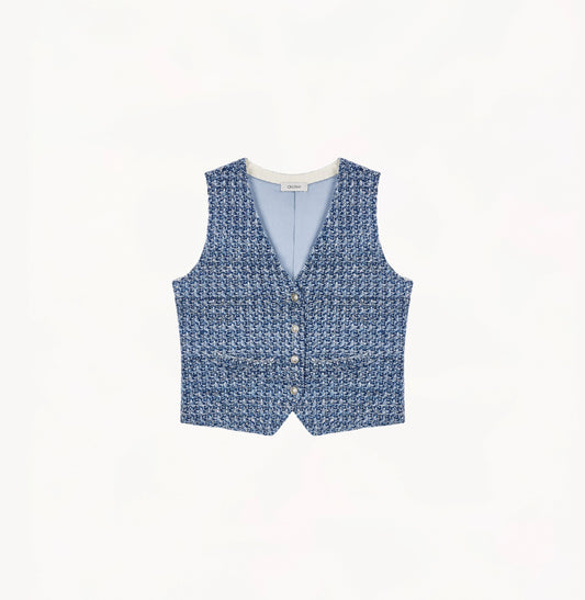Blue ladies tweed vest with relaxed V-neck, dropped shoulders, contrast ribbed trims, and signature gold buttons.
