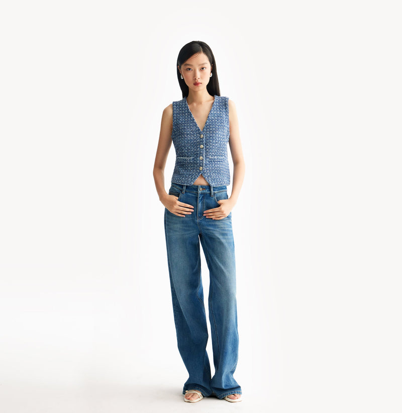 Blue ladies tweed vest with relaxed V-neck, dropped shoulders, contrast ribbed trims, and signature gold buttons. front-view