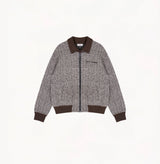 Dark grey wool bouclé plaid jacket with metallic yarn and contrast trims.