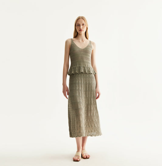 Grey green linen dress with deep V-neck, lace trim, and mesh shoulders. front-view