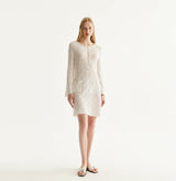 Cotton pointelle mini dress in white. front-view