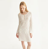 Cotton pointelle mini dress in white. left-view