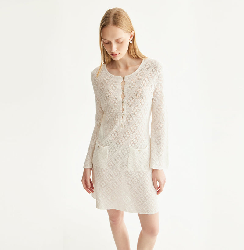 Cotton pointelle mini dress in white. left-view