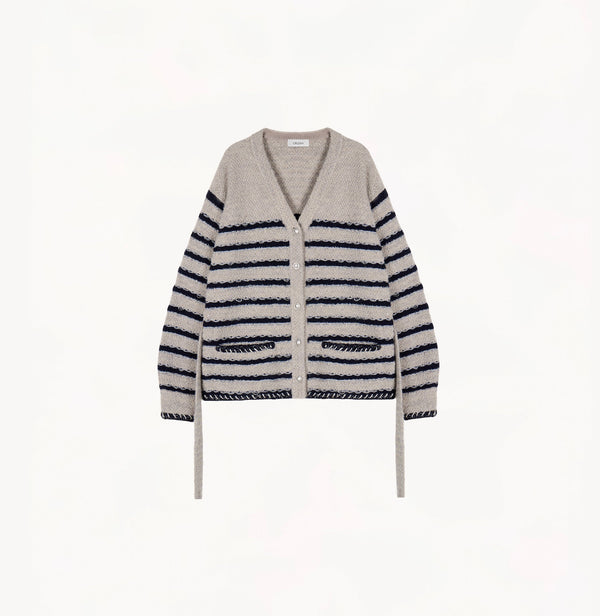 Blue bouclé wool V-neck tweed cardigan sweater with metallic threads and matching belt.