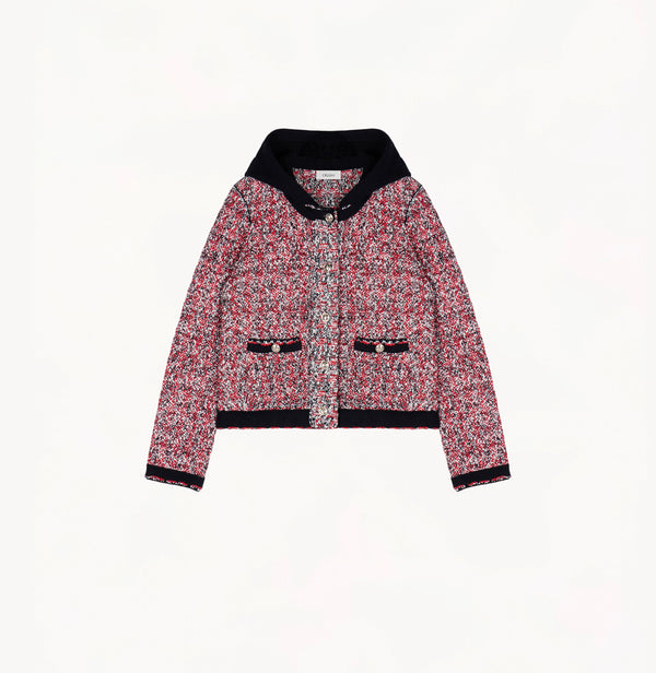 Heather black/white speckled tweed jacket for women with shoulder pads and detachable hood.