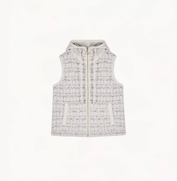 White womens tweed vest with relaxed fit hooded design metallic ring zip high collar and adjustable drawstring hem.