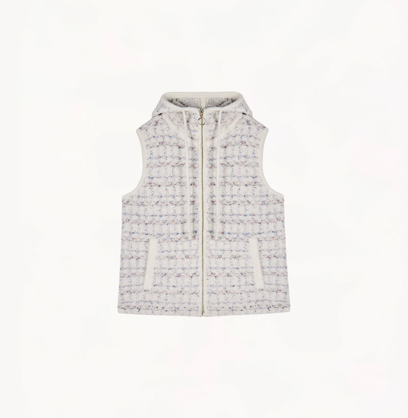 White womens tweed vest with relaxed fit hooded design metallic ring zip high collar and adjustable drawstring hem.