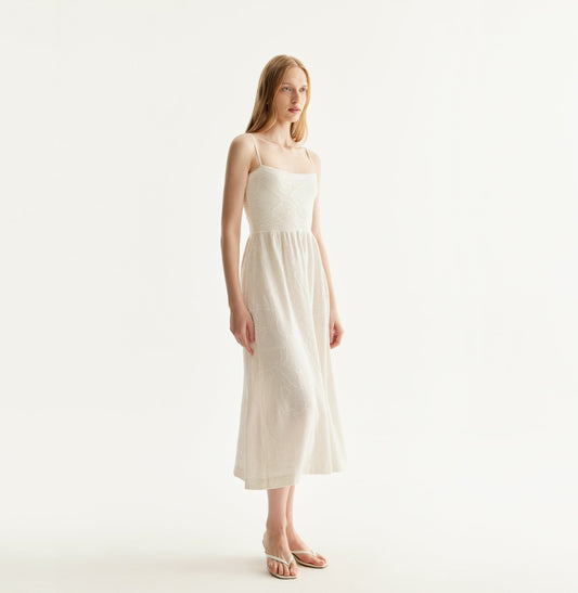 Chinese-inspired lily floral dress with cinched waist and gathered pleats in white. front-view