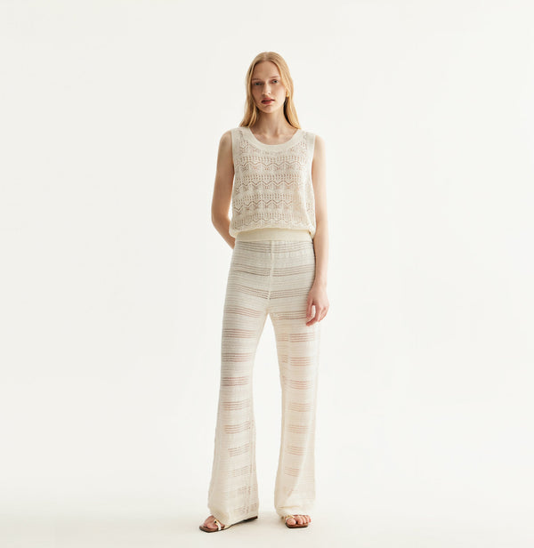 White linen pointelle tank top with sequin accents and cinched waist. front-view