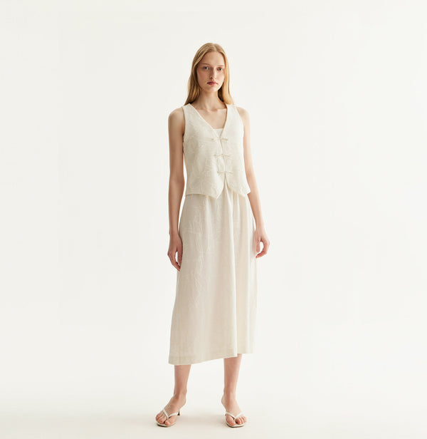 Chinese-inspired floral textured waistcoat in White. front-view