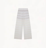 White linen trousers with sequin accents and straight-leg design.