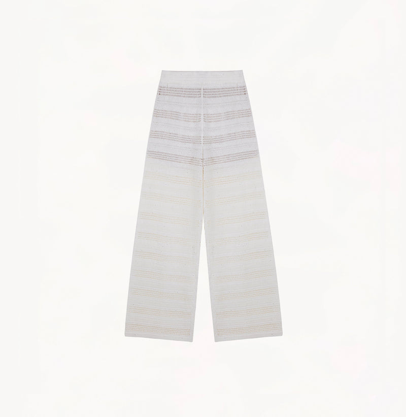 White linen trousers with sequin accents and straight-leg design.