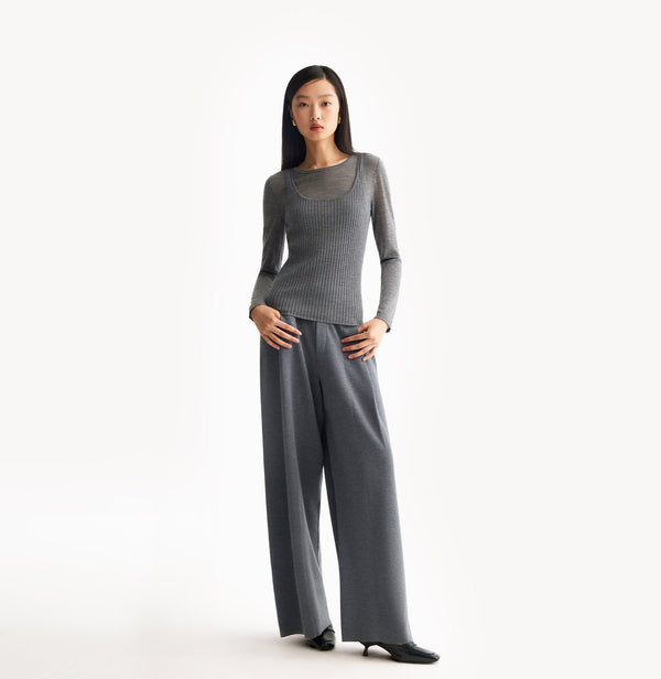 Grey wool layered top in 18 gauge knit with fitted crewneck and dimensional rib jersey texture. front-view.