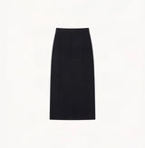 Black wool maxi skirt in thick texture with seamless belt-friendly waistband.