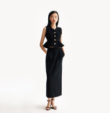Black wool maxi skirt in thick texture with seamless belt-friendly waistband.front-view.
