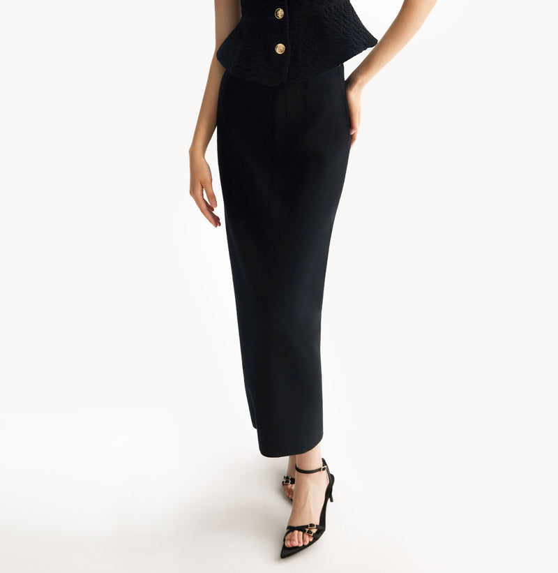 Black wool maxi skirt in thick texture with seamless belt-friendly waistband.left-view.