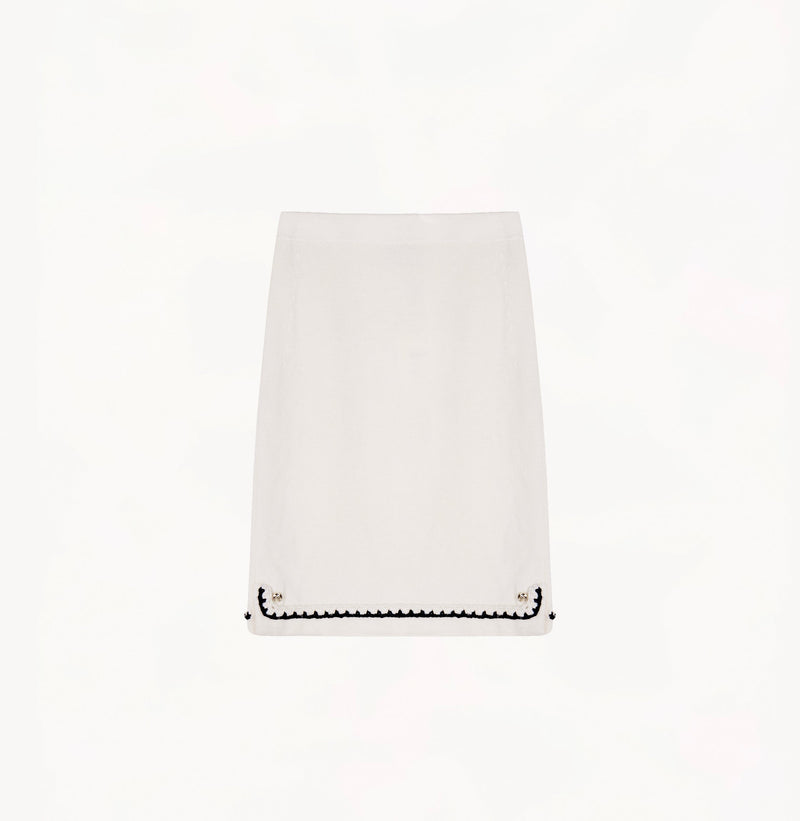 White wool-cashmere midi skirt with faux placket and hand-crocheted trim.